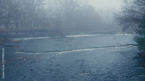 Wallpaper Mural Foggy river with dam and bare trees on a cold winter morning Torontodigital.ca