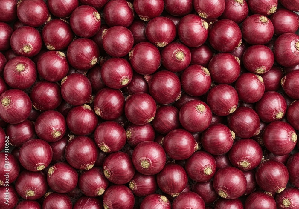 Numerous red onions arranged on a flat surface with rich color Numerous red onions arranged on a flat surface with rich color