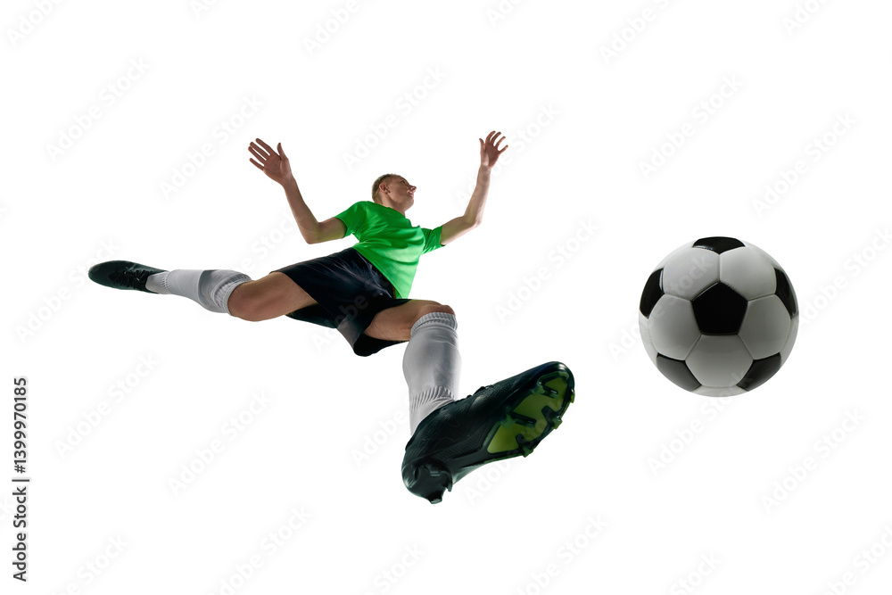 Low angle of male athlete, dressed sport uniform, soccer player leaping to kick ball in motion against white studio background. Concept of professional sport, training, tournament, energy. Ad