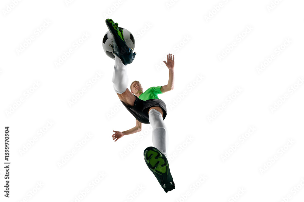 Low angle of energetic man, dressed sport uniform, soccer player sprinting with ball control against white studio background. Concept of professional sport, training, tournament, energy. Ad