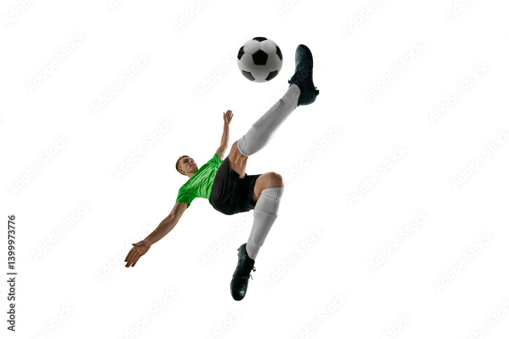 Low angle of strong man, dressed sport uniform, soccer player leaping for bicycle kick against white studio background. Concept of professional sport, training, tournament, energy. Ad