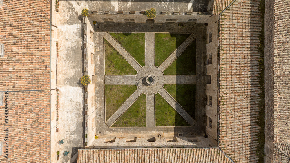 Aerial view of the Casamari Abbey courtyard located near Frosinone, Lazio, Italy. It's a Cistercian abbey, example of Italian Gothic architecture, Burgundian style. It was declared a National Monument