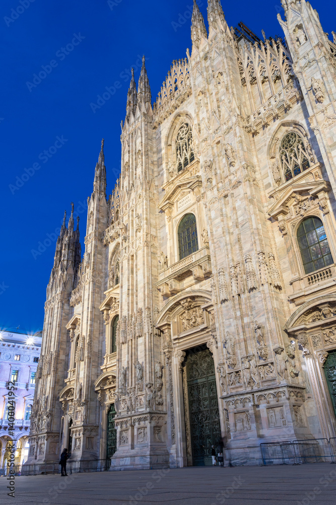 Fototapeta premium The facade of the Milan Cathedral at night