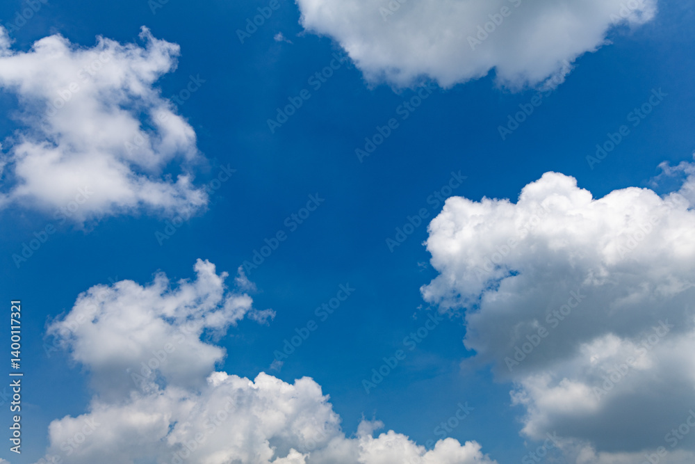 Fototapeta premium Stunning Blue Sky with Fluffy White Clouds