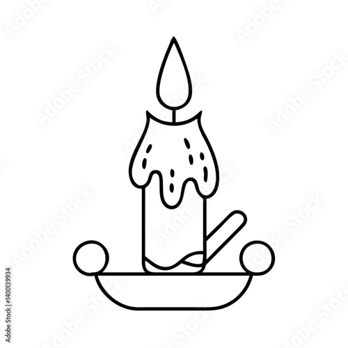 A single lit candle on a decorative candlestick holder with drippings