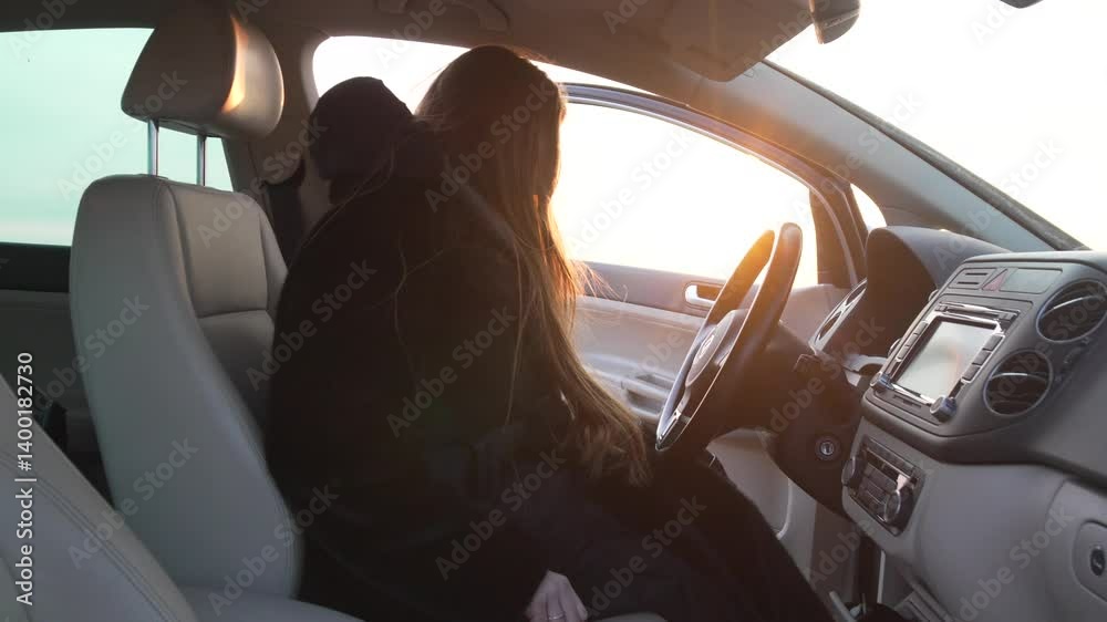Car Interior Woman Travel: Lady exits vehicle parked outdoors during the day at sunset for trip.