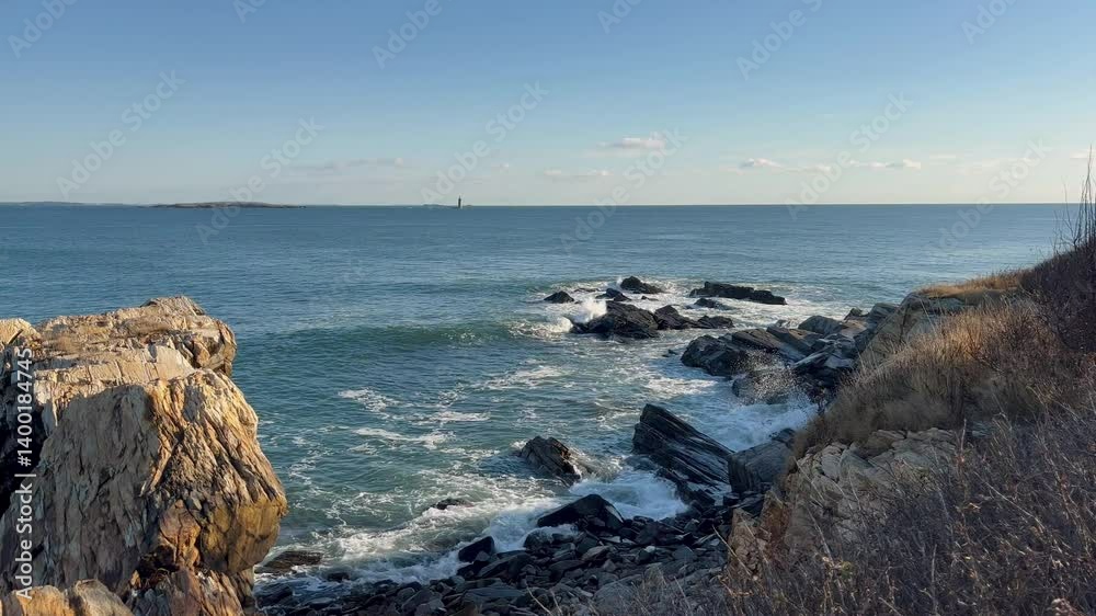 Water beating against the shore at the Atlantic Ocean in Maine