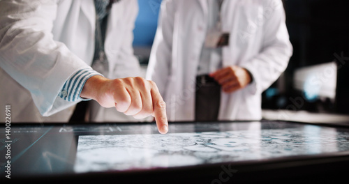 Scientist, hands and pointing with screen for lab review, medical research or teamwork. Computer table, interactive display and clinical analysis for science data, people meeting and study results