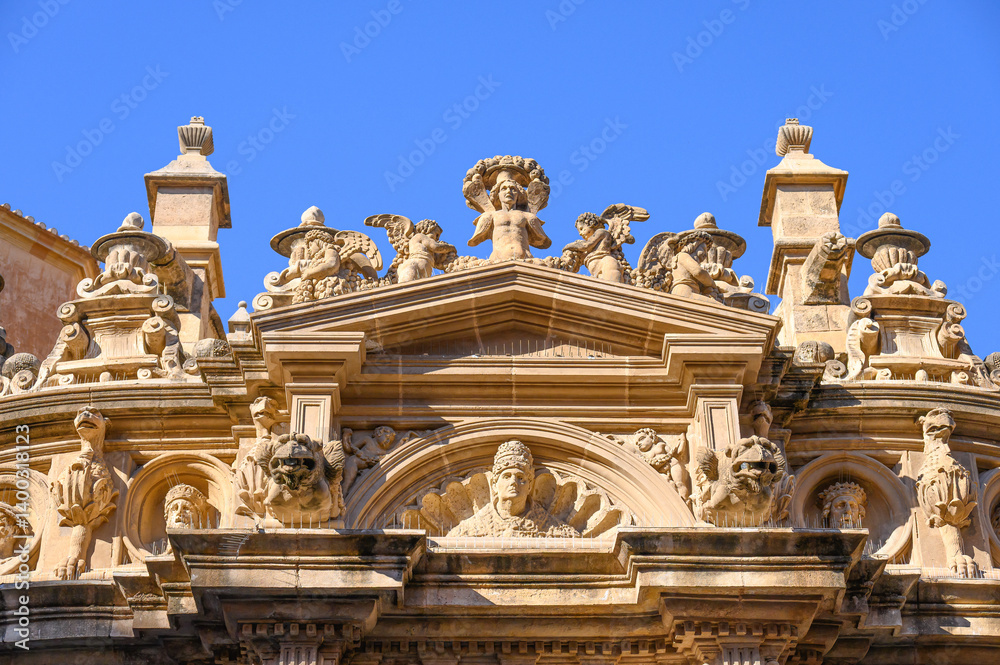 Intricate stone decorations on the exterior architecture of the