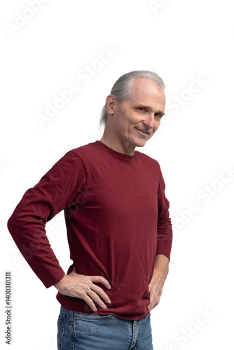 Senior man smiling with hands on hips on white background