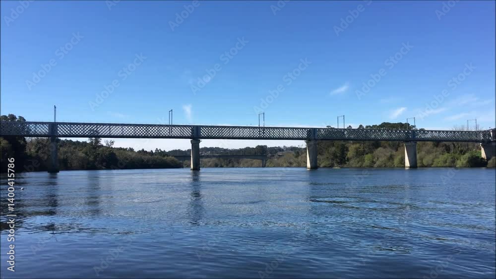 Metal road-rail international bridge over the Minho River that borders Spain in northern Portugal, Europe, Spain, Tui, Valena Metal road-rail international bridge over the Minho River that borders Spain in northern Portugal, Europe, Spain, Tui, Valena