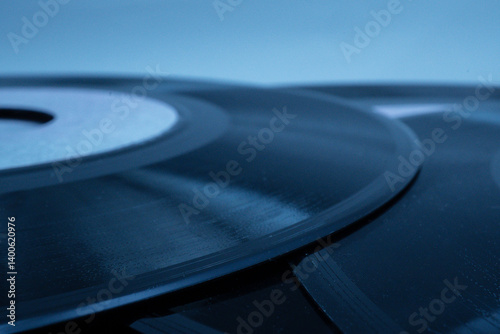 Obraz na płótnie Close up of vintage vinyl records, highlighting the grooves and label, evoking nostalgia for classic music w salonie