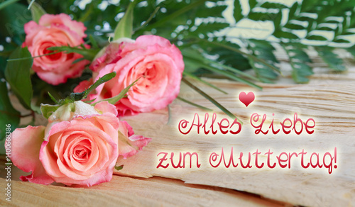 Happy Mother's Day phrase with a pink roses.