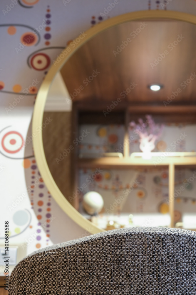 Luxurious mini suite stateroom cabin room onboard luxury cruise ship cruiseship ocean liner with bedroom and living area in red and creme with wood in modern Art Deco interior design