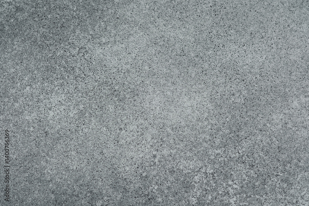 Fototapeta premium Gray speckled textured background abstract concrete surface