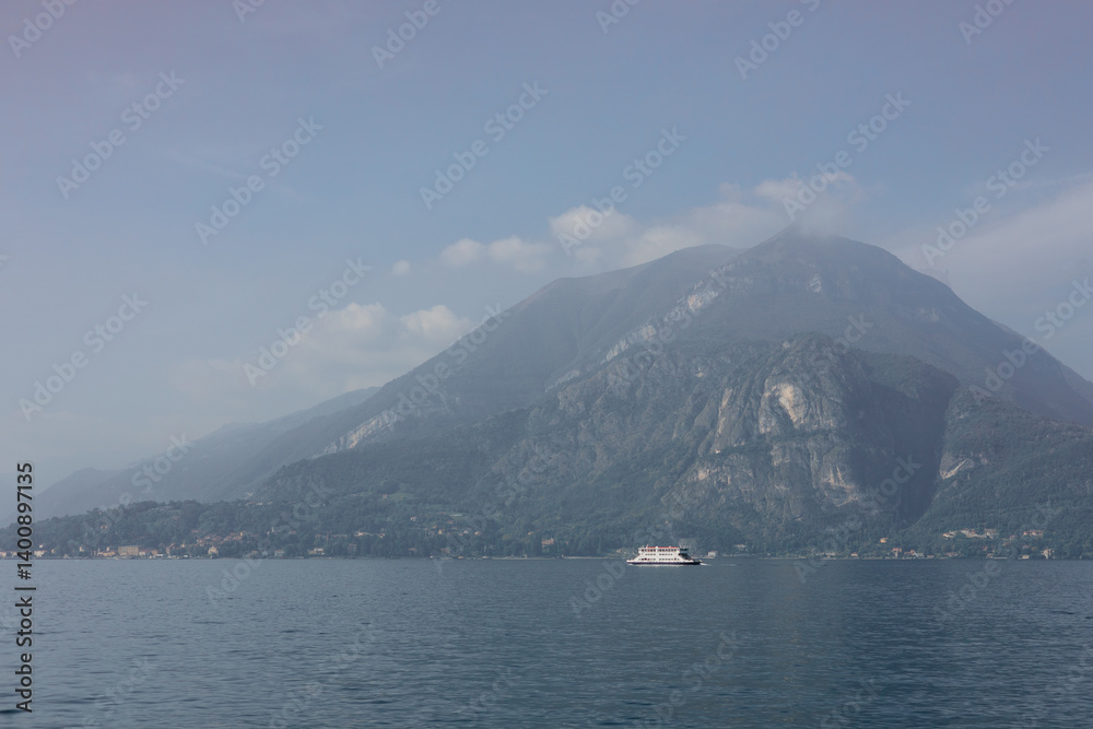 Como Lake landscape. Village, trees, water and mountains. Italy, Europe. Nature banner