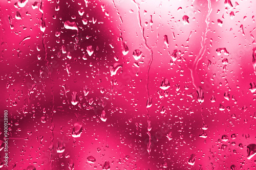 Water drops on red glass	