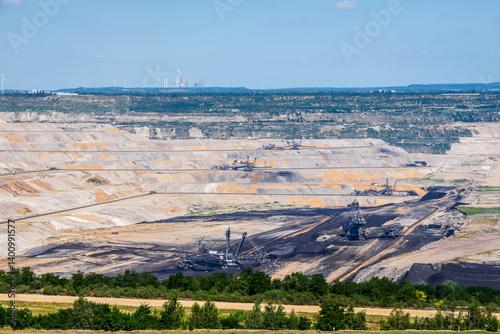 View over the Hambach coal mine, a huge open-pit mine in the west of Germany, operated by RWE and used for mining lignite with giant bucket-wheel excavators.