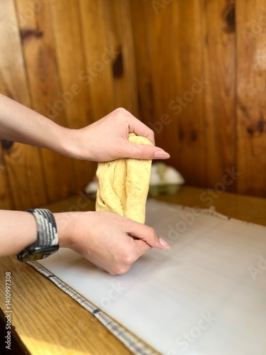 woman kneading dough