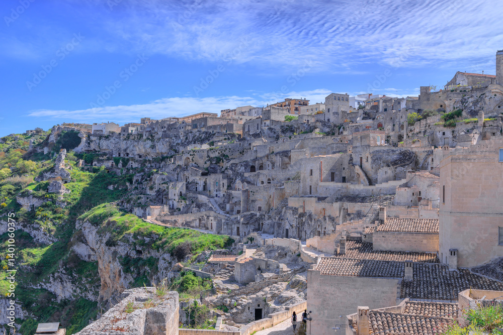 Naklejka premium Townscape of the Sassi of Matera, Italy: view of the Murgia Materana Nature Reserve and Cave Churches. 