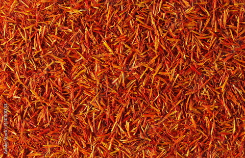 Safflower dry petals background and texture