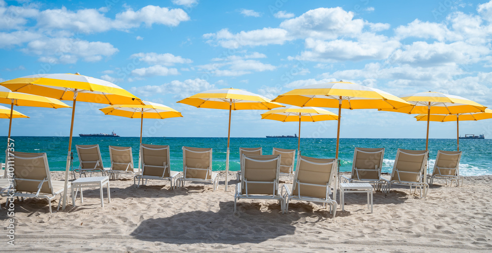 Beach Chairs and Umbrellas with Sea View on Fort Lauderale Beach, Florida