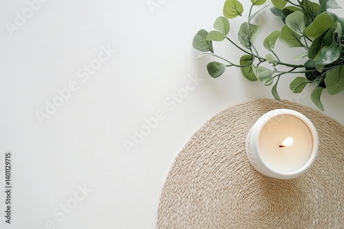 Obraz na płótnie Close-Up Warm Candle Glow on White Surface w salonie