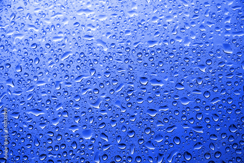 Water drops on blue glass	