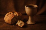 Bread and wine symbolizing the Last Supper and the body and blood of Christ in Holy Communion 
