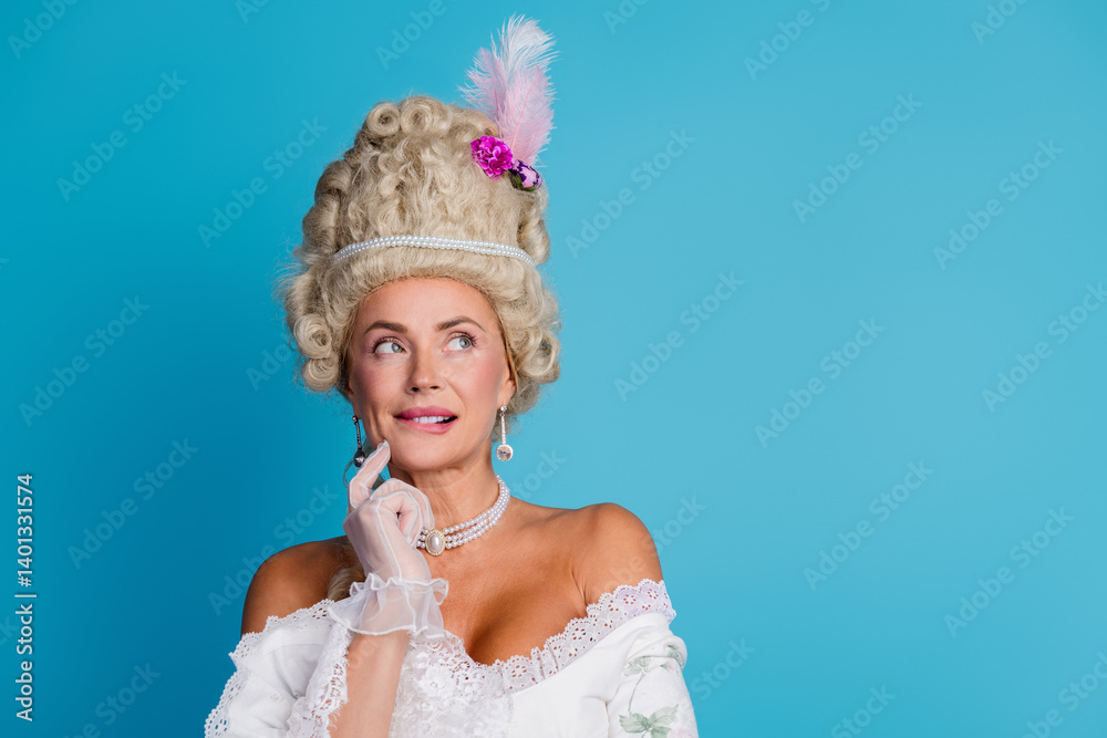Charming woman dressed in baroque style costume with sophisticated hairstyle and accessories Charming woman dressed in baroque style costume with sophisticated hairstyle and accessories
