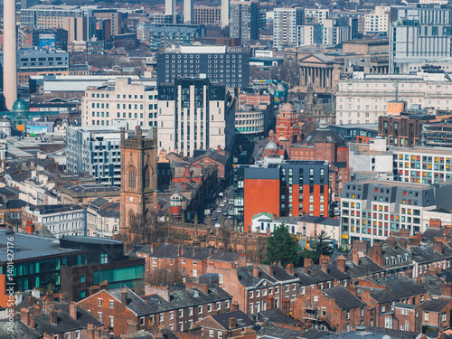 Obraz na płótnie Aerial view of Liverpool showcasing St. Luke's Church, St. George's Hall, Radio City Tower, red brick houses, and modern architecture. w salonie