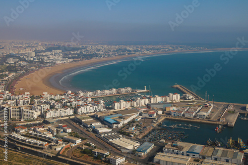 Coastal scene of agadir city, sandy agadir beach and skyline
