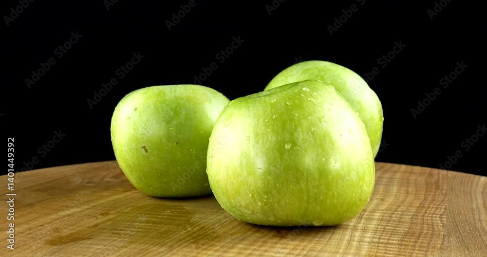 green apple on black background green apple on black background