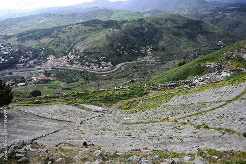 Pergamon Ancient City in Bergama. The steepest theatre in the ancient world, ruins of Pergamon, columns, statues. View of Bergama from Pergamon.