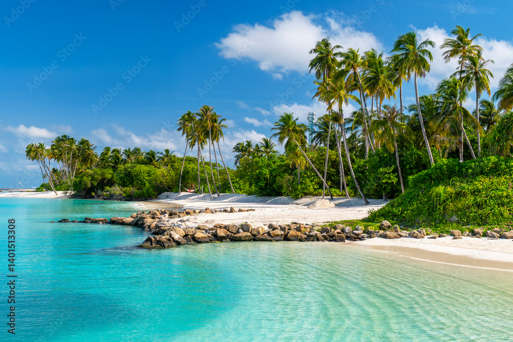 Fototapeta premium Beautiful tropical beach with white sand, palm trees, turquoise ocean against blue sky with clouds on sunny summer day, island of Maldives.