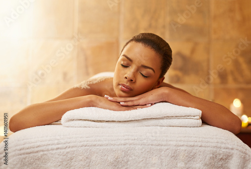 Woman, back massage and salt for treatment at spa, wellness and beauty therapy for body scrub. Female person, calm and skincare or dermatology, exfoliate and relax at resort hotel and peace for glow