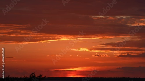  Fiery Sunset Sky Descending to Horizon