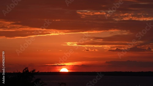  Fiery Tropical Sunset Over Horizon