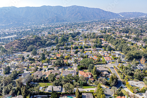 La Canada Flintridge, California – January 29, 2025: Aerial Photo for La CAnada Flintridge City with Homes, Townhouses, Streets, and Mountain View