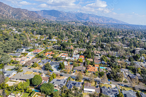 La Canada Flintridge, California – January 29, 2025: Aerial Photo for La CAnada Flintridge City with Homes, Townhouses, Streets, and Mountain View