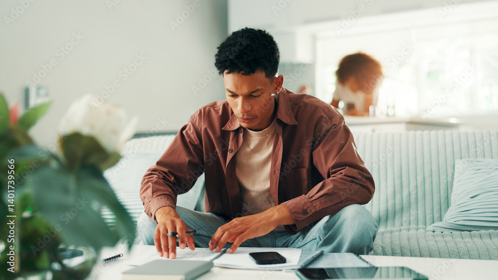Freelancer, man and planning with documents on sofa for compliance verification, financial report and budget. Auditor, remote work and invoice papers in home for risk assessment and internal auditing