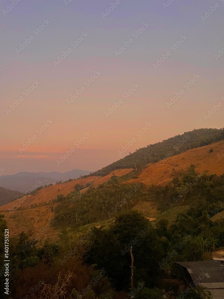 Naklejka premium sunset in the mountains