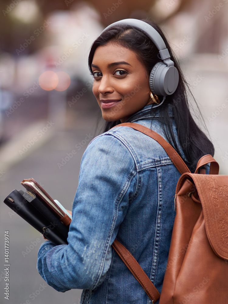 Travel, books and portrait of student with headphones for morning, journey or music on commute to lecture. University, Indian girl and smile with technology for education, learning or audio streaming