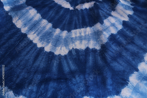 Obraz na plátně Tie and dye, also known as resist dyeing, is a textile dyeing technique that cre