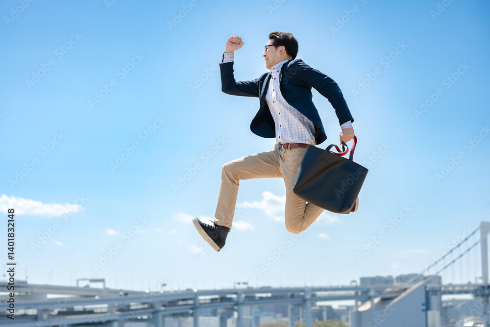ジャンプするビジネスマン
