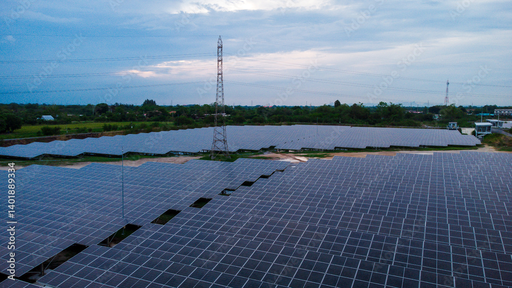 multiple solar panels installed on the rooftop of a building. The solar panels are arranged in neat rows and columns, with clear separations between each panel.