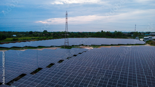 Obraz na płótnie multiple solar panels installed on the rooftop of a building. The solar panels are arranged in neat rows and columns, with clear separations between each panel. w salonie