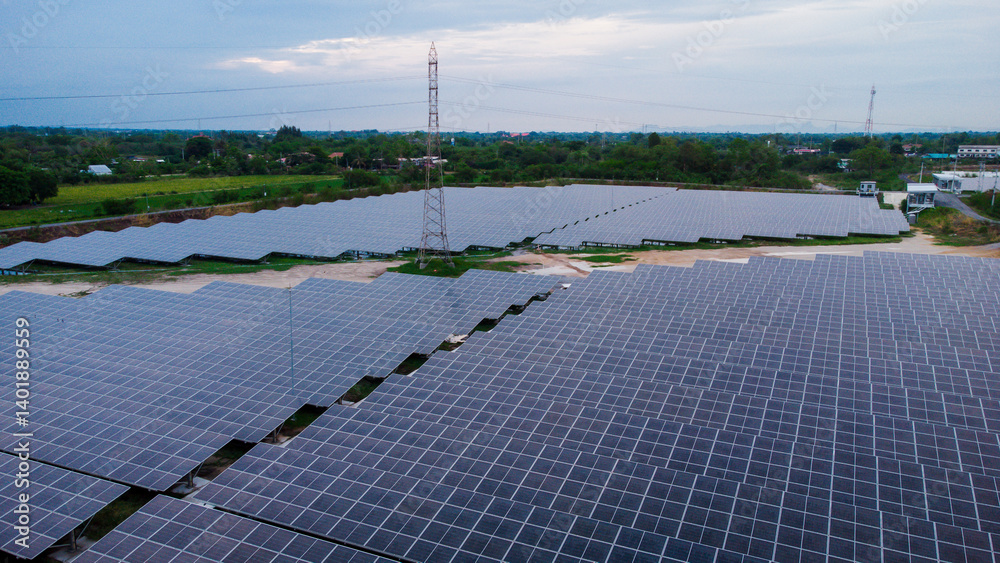 multiple solar panels installed on the rooftop of a building. The solar panels are arranged in neat rows and columns, with clear separations between each panel.