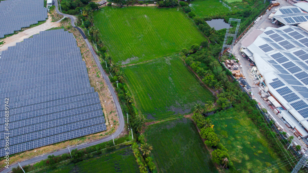 multiple solar panels installed on the rooftop of a building. The solar panels are arranged in neat rows and columns, with clear separations between each panel.