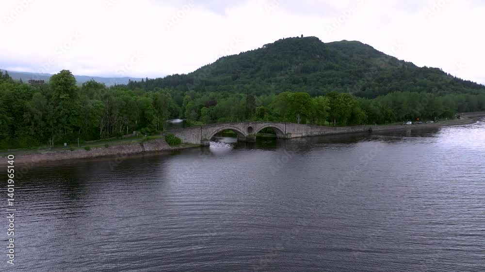 A Scottish bridge is over a body of water A Scottish bridge is over a body of water